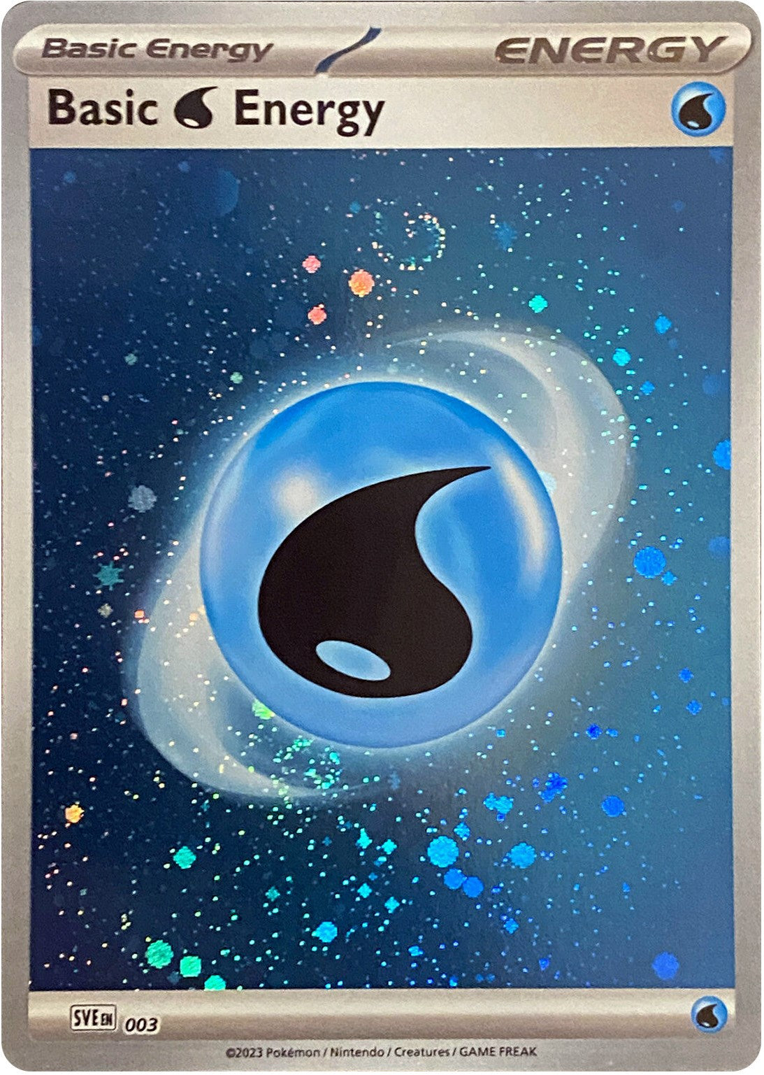 Basic Water Energy (Cosmos Holo) - SV01: Scarlet & Violet Base Set [COMMON]